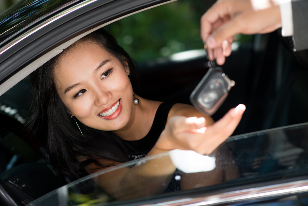 Glamorous young lady being happy with her purchase